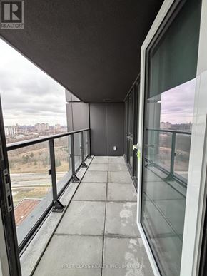 Toronto (Banbury-Don Mills) condo for rent - A balcony with a view of the cityscape.