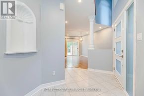 Oakville (Jc Joshua Creek) townhouse for rent - A hallway with a white door and a light switch on the wall.