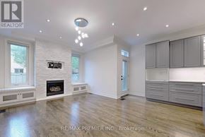 Vaughan (Patterson) apartment for rent - A spacious living room with a fireplace and built-in cabinets.
