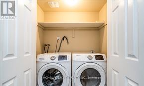 Barrie (Edgehill Drive) apartment for rent - Two washing machines in a small laundry room.