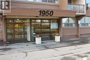 Hamilton condo for rent - The front of a building with the number 1950 on it.