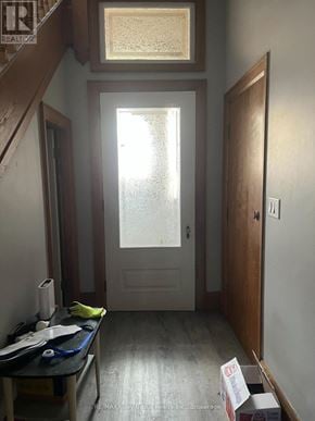 Arran-Elderslie apartment for rent - A room with a table and a box on the floor.
