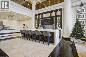 Hamilton condo for rent - A realtor's office with a bar and a Christmas tree.