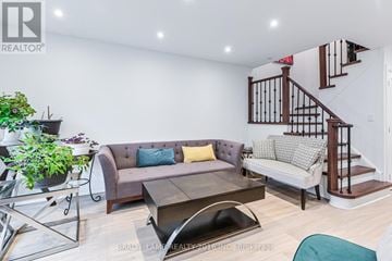 Vaughan (Crestwood-Springfarm-Yorkhill) apartment for rent - A living room with a grey couch and a glass table.
