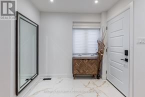 Vaughan (Crestwood-Springfarm-Yorkhill) apartment for rent - A white bathroom with a marble floor and a glass shower door.