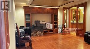 Vancouver apartment for rent - A living room with wooden floors and furniture.