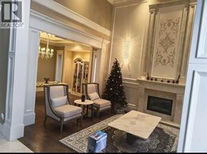 Richmond apartment for rent - A living room with a Christmas tree and a fireplace.