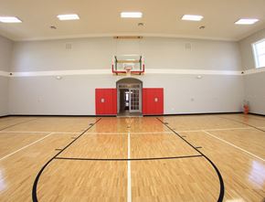 Midway Park apartment for rent - a large gym with a basketball court and a basketball hoop