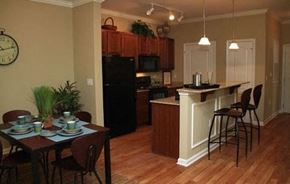 Midway Park apartment for rent - a kitchen and dining room with a table and chairs