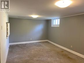 Toronto (East York) apartment for rent - A room with a window and a door, presented by HomeLife Landmark Realty Inc. Brokerage.