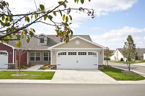 Fort Wayne apartment for rent - A house with a white garage door is shown in the image.