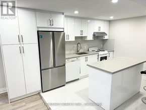 Markham (Sherwood-Amberglen) apartment for rent - A modern kitchen with white cabinets and stainless steel appliances.
