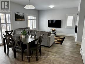 Blue Mountains apartment for rent - A dining room with a table set for four.