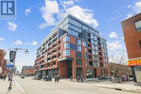 Ottawa condo for rent - A modern multi-story building with a glass facade is the main focus of the image.