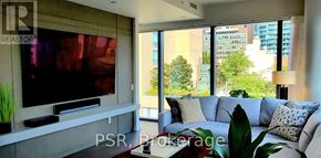 Toronto (Church-Yonge Corridor) condo for rent - A living room with a television and a couch.