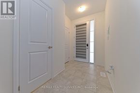 Cambridge townhouse for rent - A hallway with a white door and a white wall.