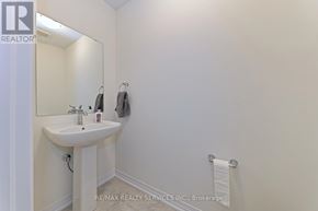 Cambridge townhouse for rent - A white sink in a small bathroom.