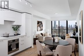 Toronto (Thorncliffe Park) condo for rent - A modern kitchen with a dining table set for four.