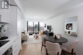 Toronto (Thorncliffe Park) condo for rent - A modern kitchen with a dining table set for two.
