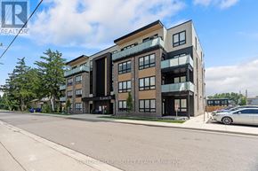 South Huron (Exeter) multi-family for rent - A modern multi-story building with a car parked in front.