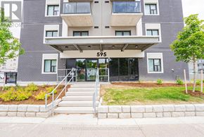 Kitchener condo for rent - The front of apartment building number 595 is shown.