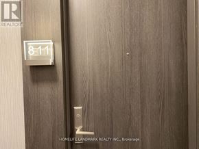 Markham (Unionville) condo for rent - A door with a sign that says 8-11 on it.
