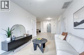Lasalle condo for rent - A living room with a white couch and a coffee table.