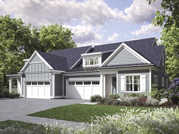 Shrewsbury apartment for rent - A house with a grey roof and white garage doors.