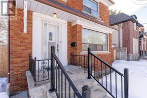Toronto (O'connor-Parkview) apartment for rent - A house with a white door and black railings.