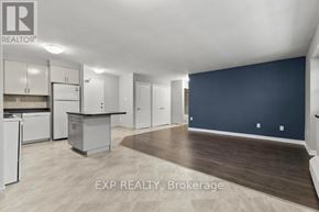 St. Catharines (Bunting/Linwell) multi-family for rent - A kitchen area with a dining table and chairs.