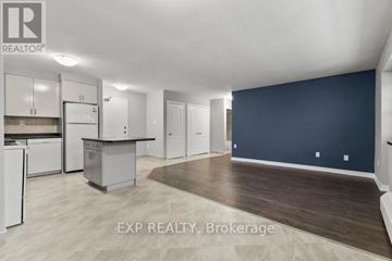 St. Catharines (Bunting/Linwell) multi-family for rent - A kitchen area with a dining table and chairs.