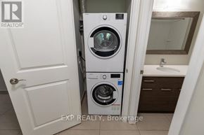 St. Catharines (E. Chester) multi-family for rent - A white door with a Realty logo on it.