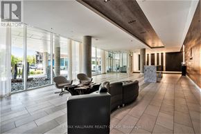 Ottawa condo for rent - A modern office lobby with a reception desk and chairs.
