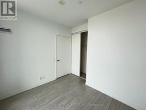 Vaughan (Vaughan Corporate Centre) condo for rent - A room with a white door and a white wall.