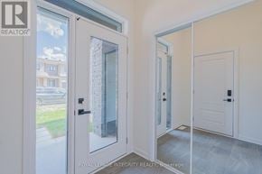Ottawa townhouse for rent - A white door with a glass window is open.