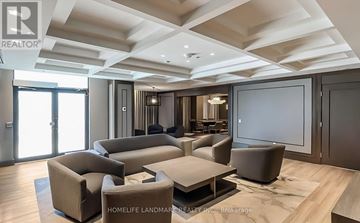 Markham (Unionville) condo for rent - A spacious living room with a large sectional sofa and a coffee table.