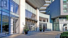 Toronto (Willowdale West) condo for rent - The front of a building with the sign "International Realty Firm, Inc. Brokerage" on it.