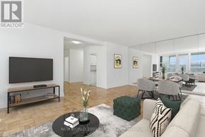 Toronto (Rosedale-Moore Park) condo for rent - A living room with a television, a coffee table, and a couch.