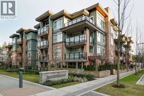 Vancouver apartment for rent - A modern apartment building with balconies and a brick facade.