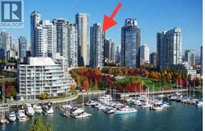 Vancouver apartment for rent - A cityscape with a red arrow pointing to a building.