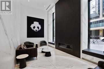 Toronto (Bay Street Corridor) condo for rent - A living room with a panda painting on the wall.