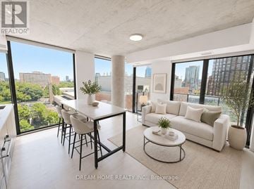 Toronto (Church-Yonge Corridor) condo for rent - A modern living room with a dining table and a couch.