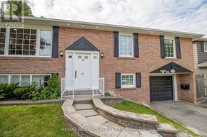 Newmarket (Gorham-College Manor) apartment for rent - A brick house with a white door and black shutters.