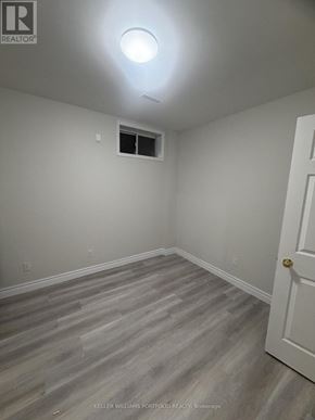 Toronto (Malvern) apartment for rent - A room with a door and a window.