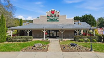 Clarkesville apartment for rent - A building with a sign that reads "Apple Manor Nursing Home".