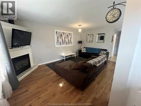 Chatham apartment for rent - A living room with a fireplace and a couch.