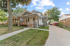 Windsor apartment for rent - A house with a stone pillar in front of it.
