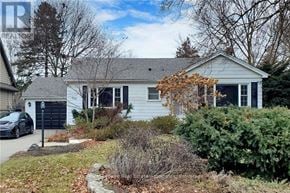 Burlington (Lasalle) apartment for rent - A house with a grey roof and a white garage door.