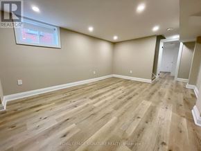Hamilton (Inch Park) apartment for rent - A room with wooden flooring and a window.