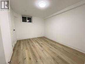 Hamilton (Inch Park) apartment for rent - A room with wooden flooring and a window.